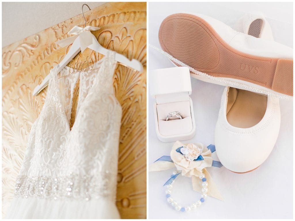Bride's details of wedding dress, shoes, ring box, and florals.