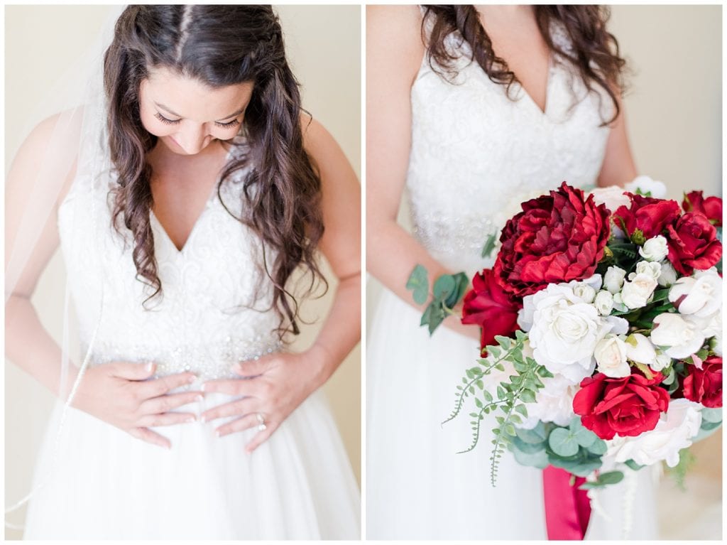 Bride with red and white bouquet at Country Inn & Suites Grand Rapids.