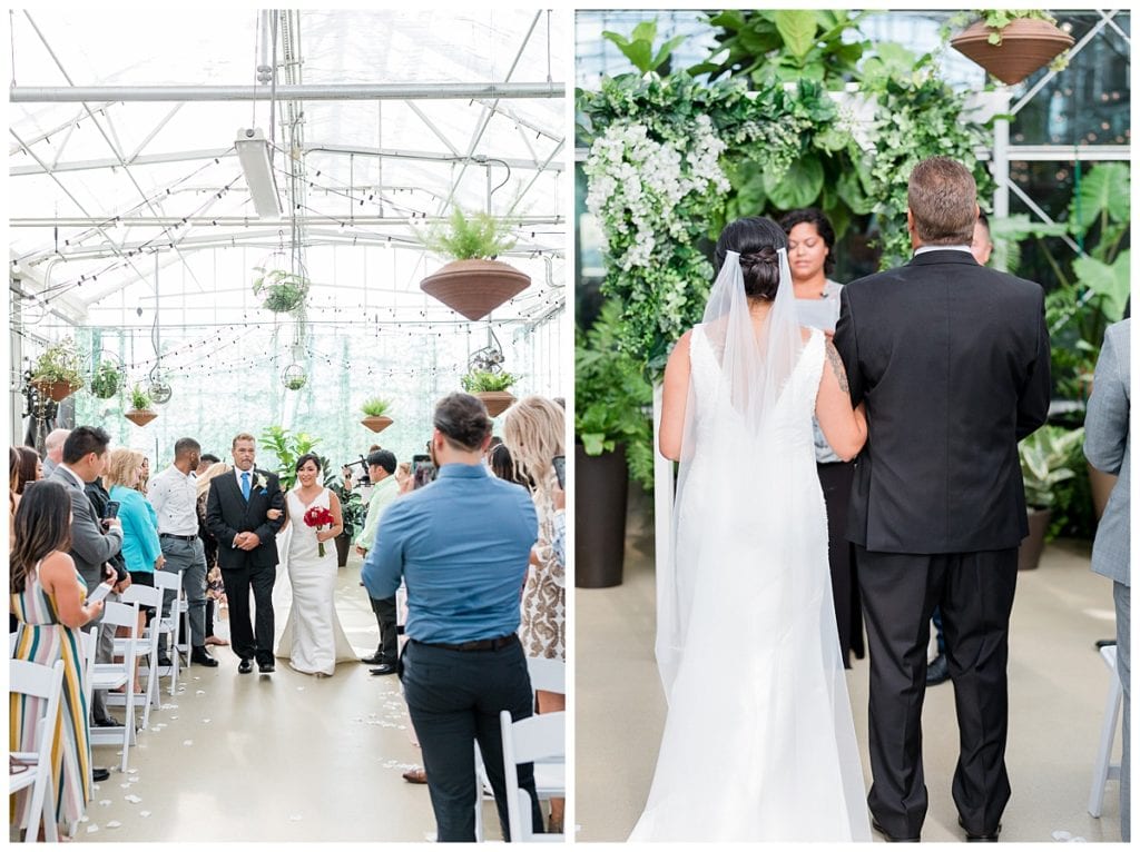 Bride coming down the aisle during wedding ceremony in Greenhouse wedding at Downtown Market.