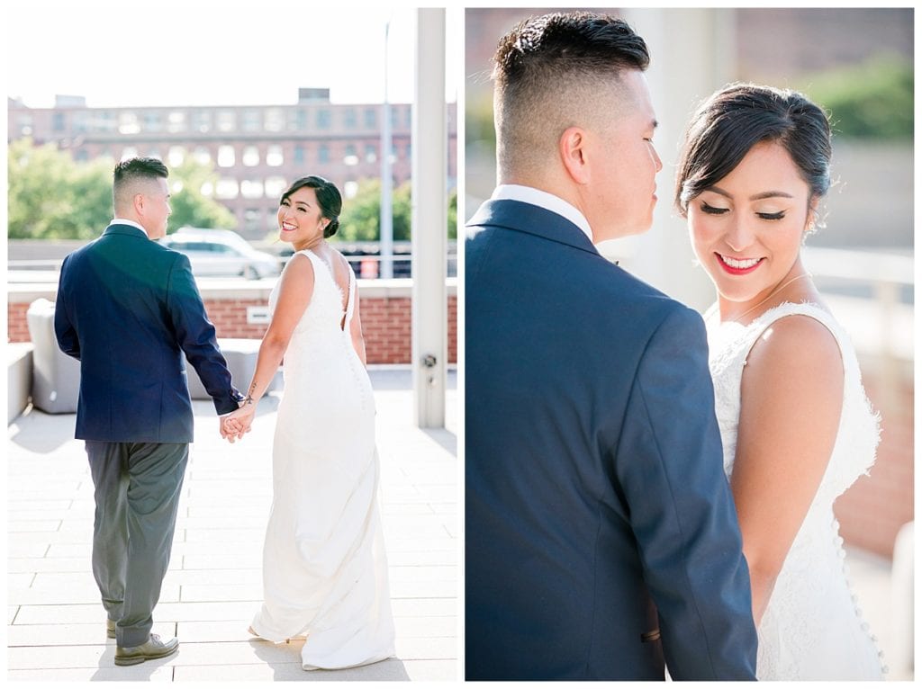 Asian groom and Hispanic bride on rooftop at Downtown Market wedding.