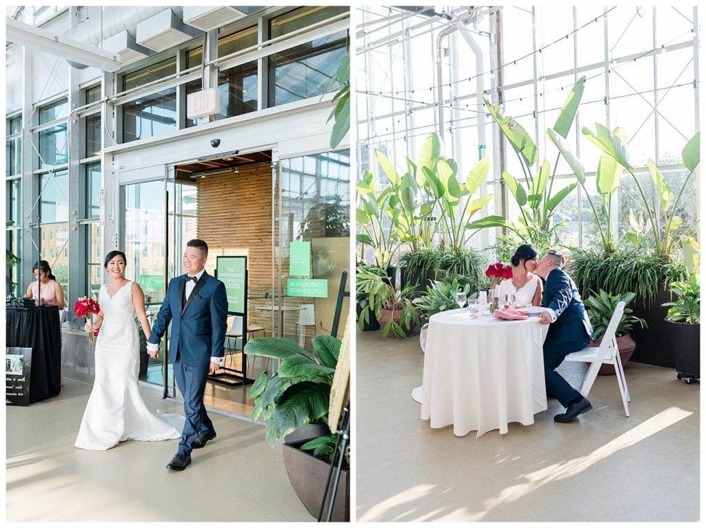 Bride and groom during grand entrance  and kissing at head table in Greenhouse on Downtown Market wedding.