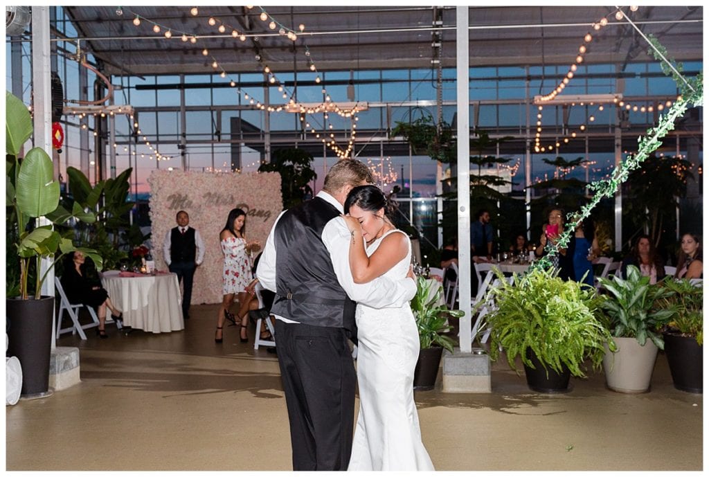 Bride crying on father during and dancing at Downtown Market wedding.